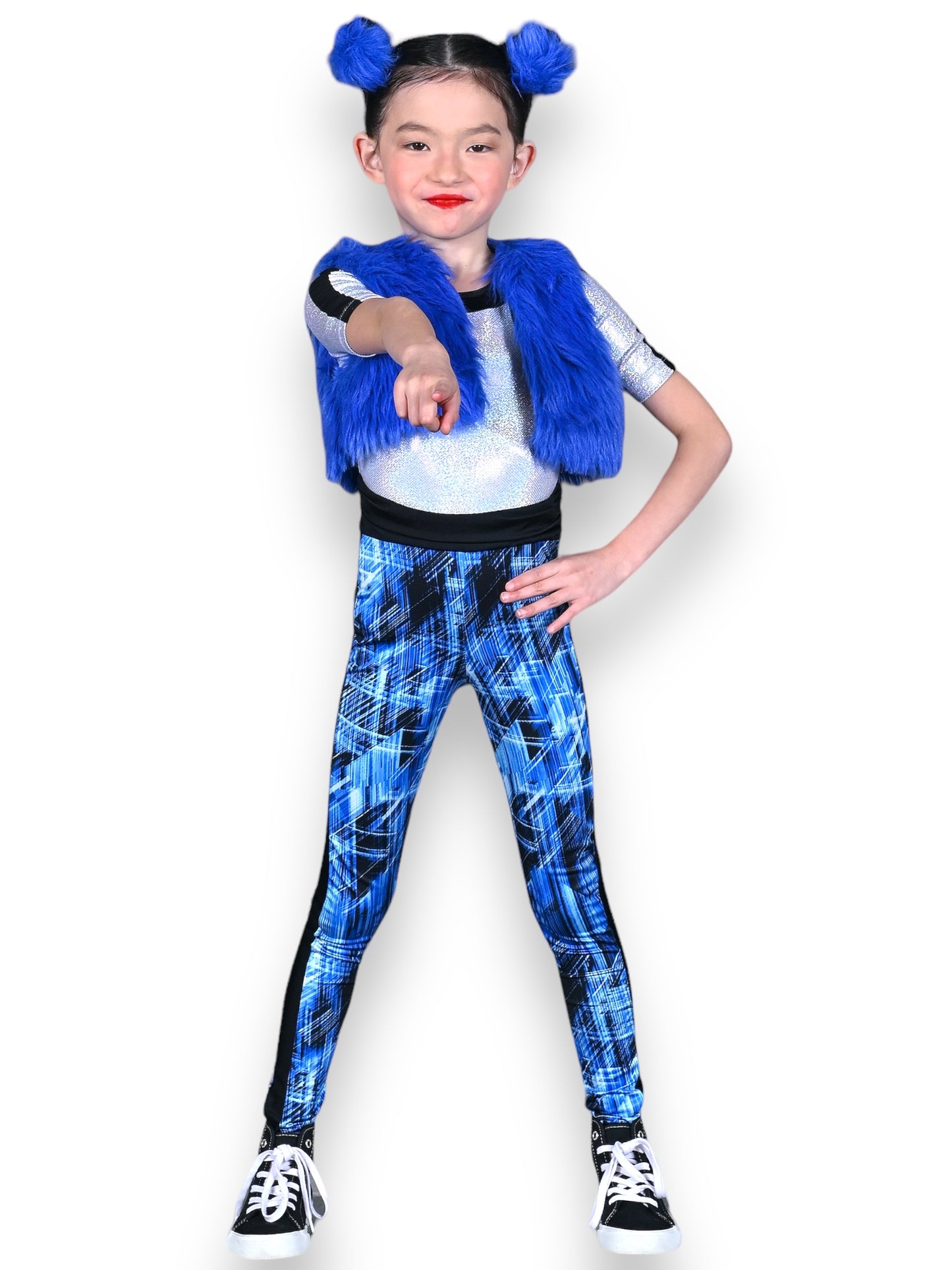 Medium child in blue and silver spandex unitard with foil dot details, complemented by a blue faux fur vest. The child has two blue hair poufs with clips.