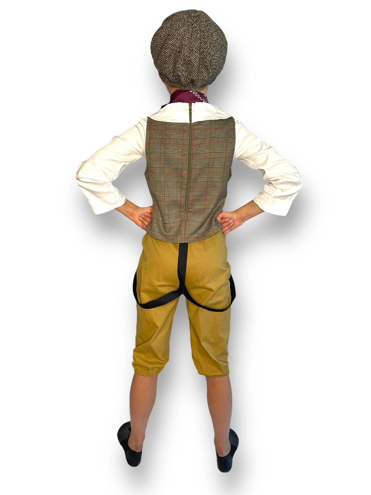 Consigned Oliver-inspired musical theatre costume from Weissman includes shirt, pants, newsboy cap, and bandana.